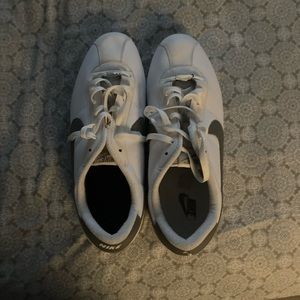 Nike sneakers. Never worn in pristine condition.